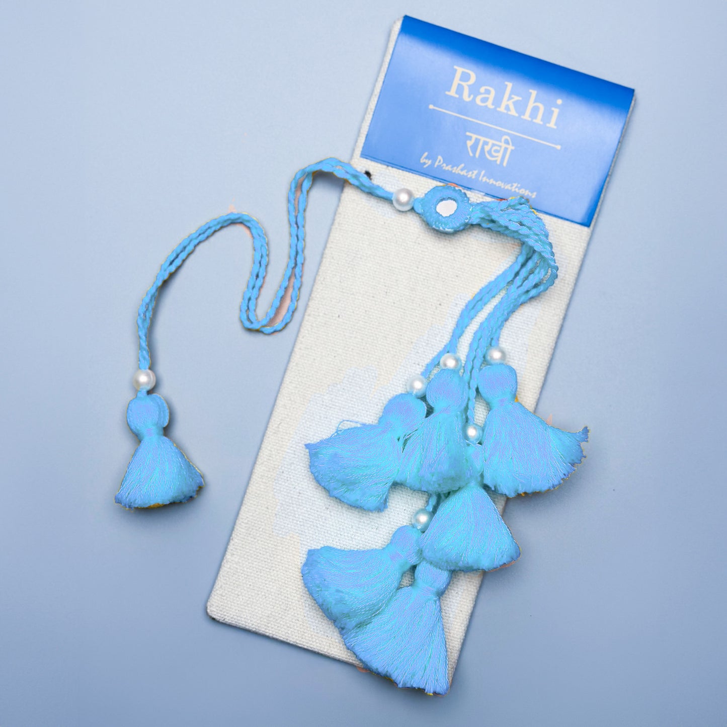 Handmade Lumba Rakhi | Sky Blue Fine Yarns
