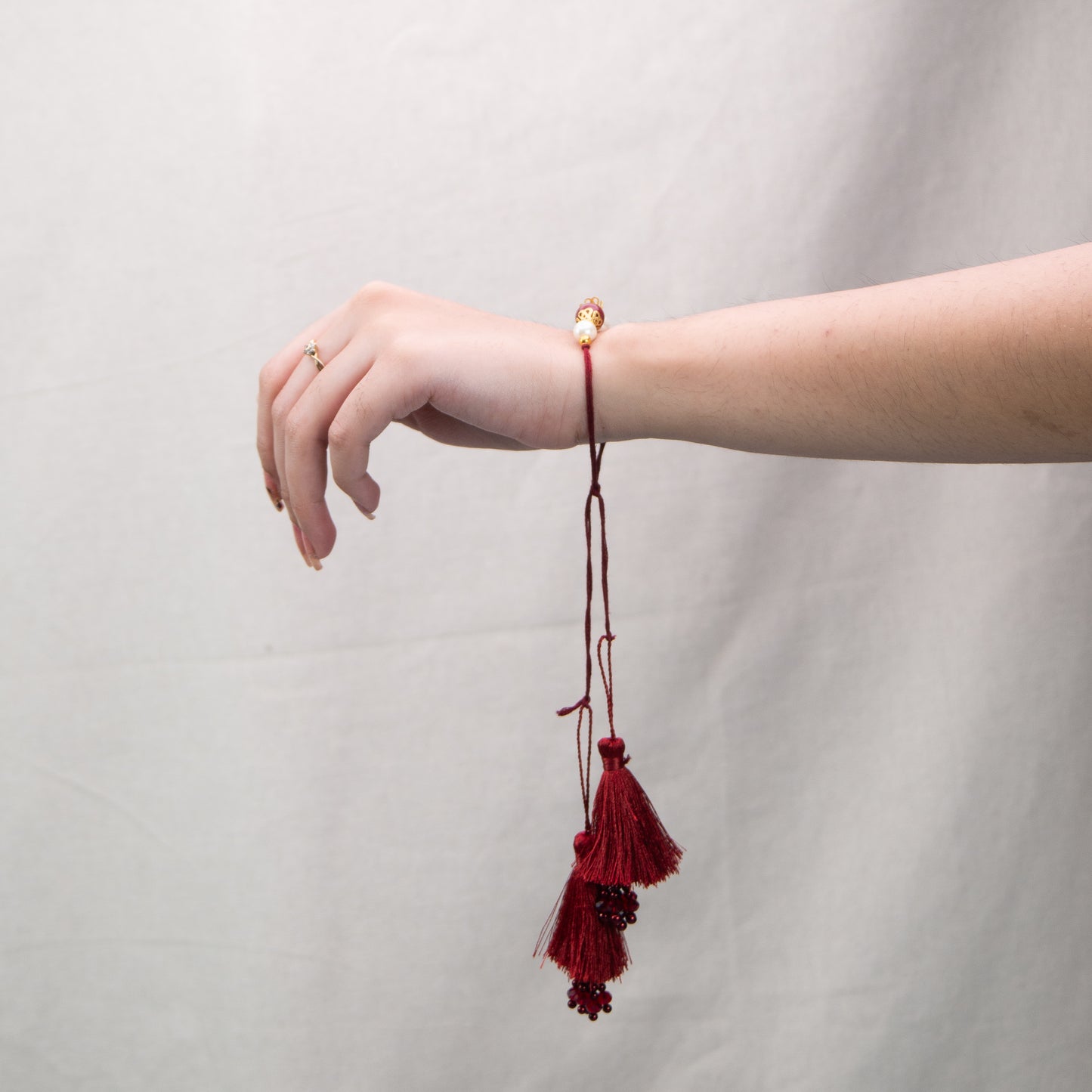 Handmade Lumba Rakhi | Red with Crystal and Fringes
