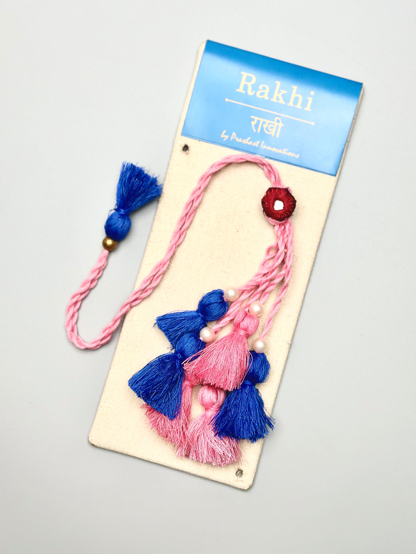 Handmade Lumba Rakhi | A Symphony of Blue and Pink Color